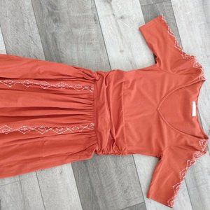 Synergy Organic Clothing, SM, rust colored with cream geometric pattern details